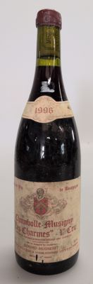 a bottle of wine that is sitting on a table