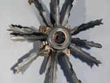 a clock made out of keys on a white surface