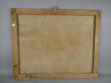 an old wooden frame with a piece of paper hanging on it