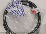 a close up of a black hose on a white surface
