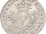 a close up of a coin with a crown on it