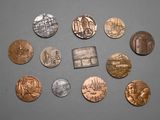 a lot of coins that are on the table