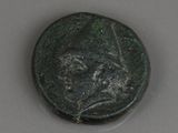 une pièce ancienne sur laquelle figure le visage d'un homme