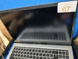a laptop that is sitting on a blue table
