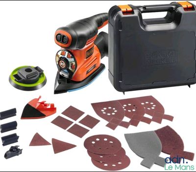 a black and decker orbital sander with tools and accessories