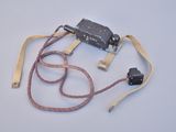 a small electronic device that is connected to a cord