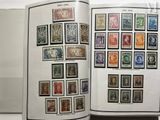 an open book with a lot of stamps on it