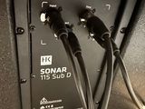 a close up of a speaker with wires attached to it
