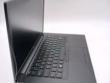 a laptop computer sitting on a table with a white background