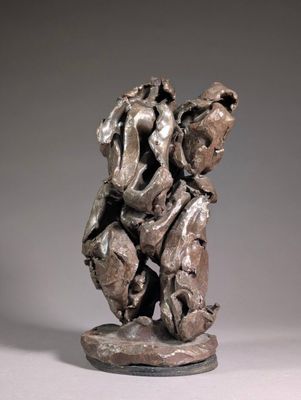 statue of a man holding a dog on his back