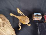 three items that are sitting on a black cloth
