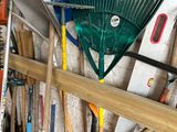 many different types of garden tools in this garage