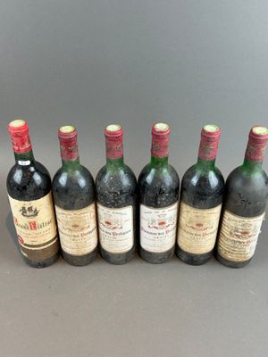 six bottles of wine lined up in a row on a table