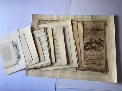 several old books are stacked on top of each other on a table