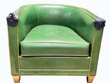 an image of a green leather chair on a white background