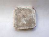 an image of a white plate on a table with a white background