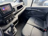 the interior of a car with a steering control and dashboard controls
