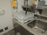 a sink and a dish rack in a kitchen