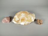 a piece of rock that is next to some rocks