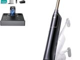 a vacuum that is sitting on the floor next to other items