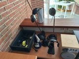 a desk with a computer and a lamp on it
