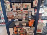 a shelf with various items on it in a store