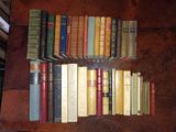 a lot of books that are on a table