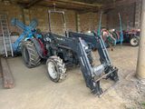 a tractor that is parked in a building