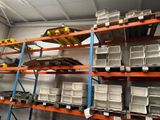 a large rack with lots of boxes on it in a warehouse