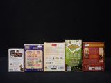 five boxes of food that are sitting on a table