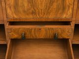 an image of a wooden cabinet with two drawers and a drawer