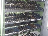 many different types of tools on display in a glass case