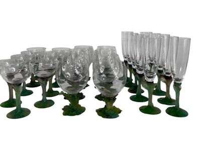 a lot of wine glasses that are sitting on a table