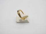 an image of a gold ring with a black stone on it