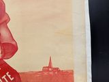 a poster of a woman holding a stop sign in front of a church