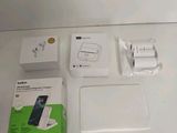 a box with a charger, a charger, and a charger attached to it