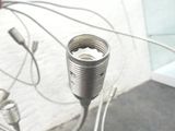 a close up view of a metal object with wires
