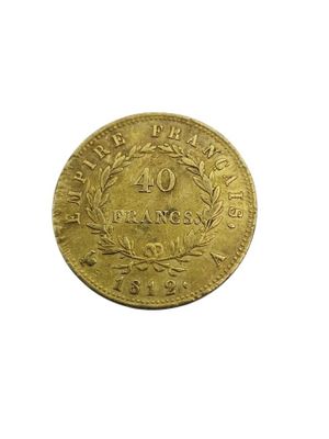 a close up of a gold coin on a white background