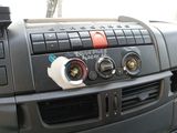 a car dashboard with a bunch of buttons on it
