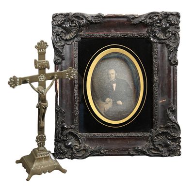 a picture of a man holding a cross in front of a cross