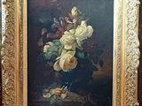 une peinture de fleurs dans un vase sur une table