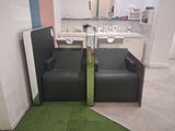 two chairs that are sitting next to each other in the room
