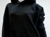 an image of a mannequin wearing a black hoodie
