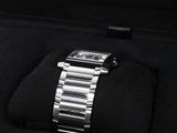 a watch that is sitting in a case on a table