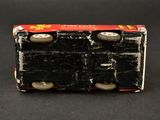 a black and red box with three wheels on it