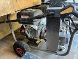 a small engine that is sitting on a cart