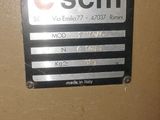 a box that has a sign on it that says scm