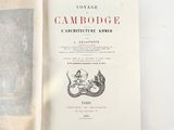 an old book with a drawing of a dragon on it