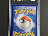 a close up of a pokemon card on a table