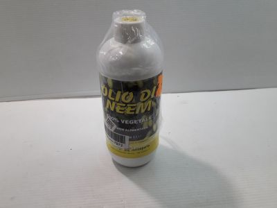 a bottle of liquid that is sitting on a table